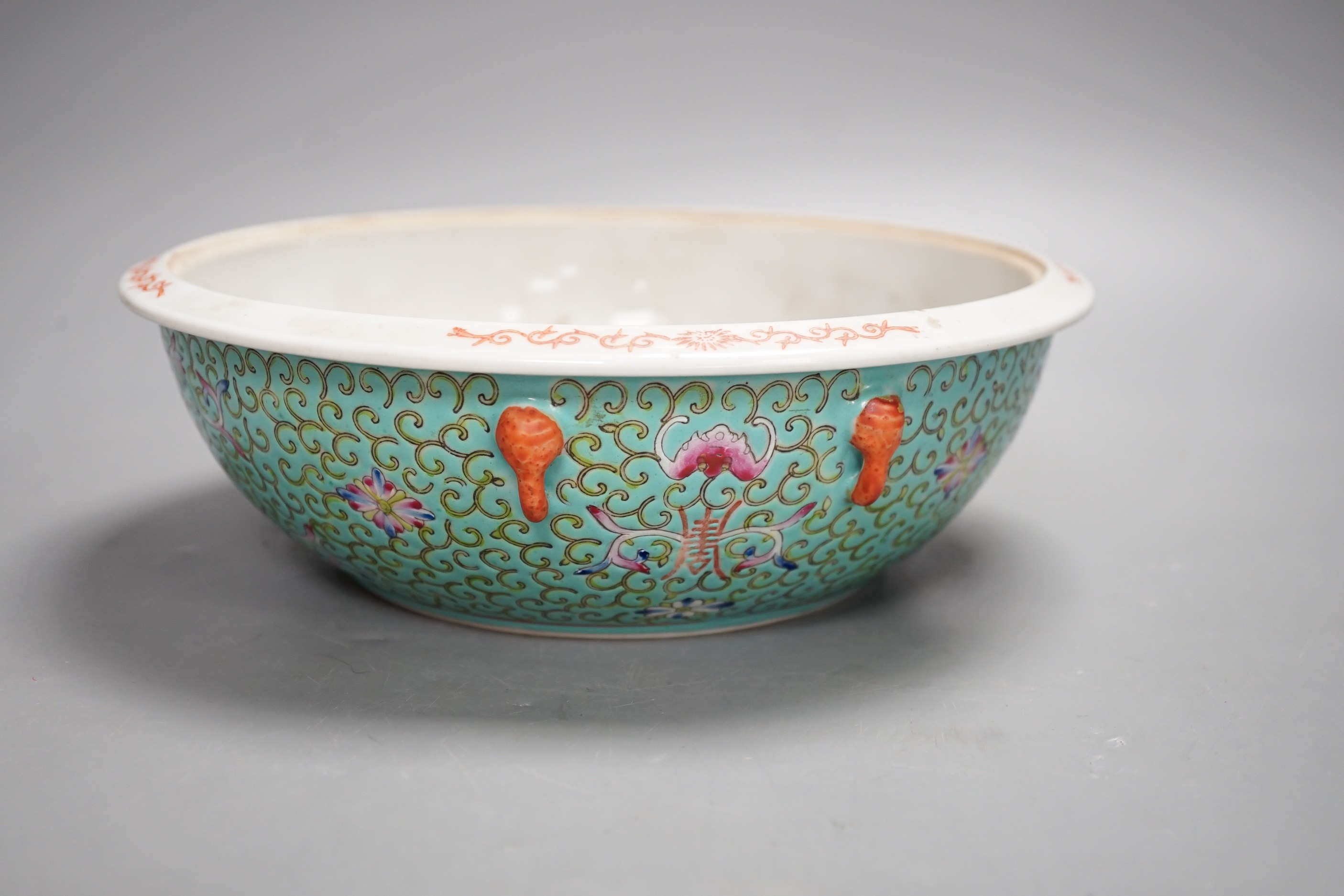 A 20th century Chinese famille rose turquoise ground floral bowl. 23.5cm diameter, lacking cover